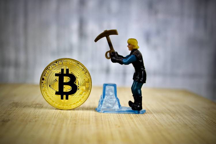 A sleek ASIC miner in action, showcasing the hardware that drives Bitcoin's backbone